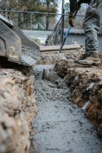 a person digging in the dirt